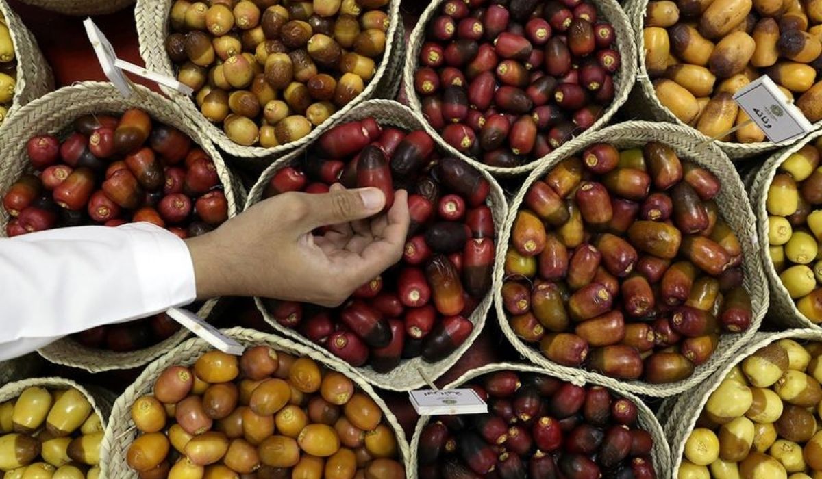 Visitors enjoying local date festival at Souq Waqif in Qatar